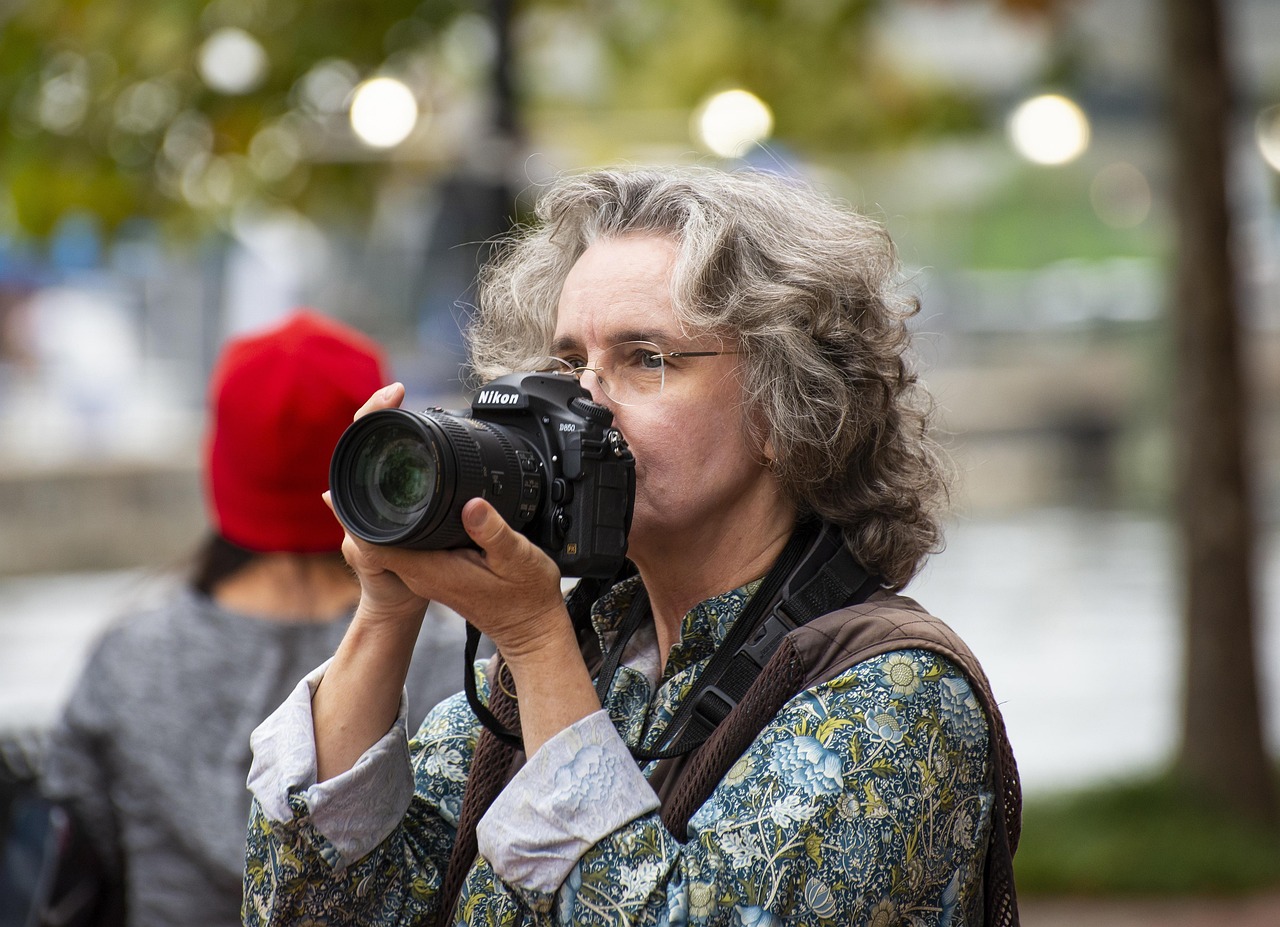 Camera, photographer, woman — Choosing the Best SMS Receive Solution for Your Needs