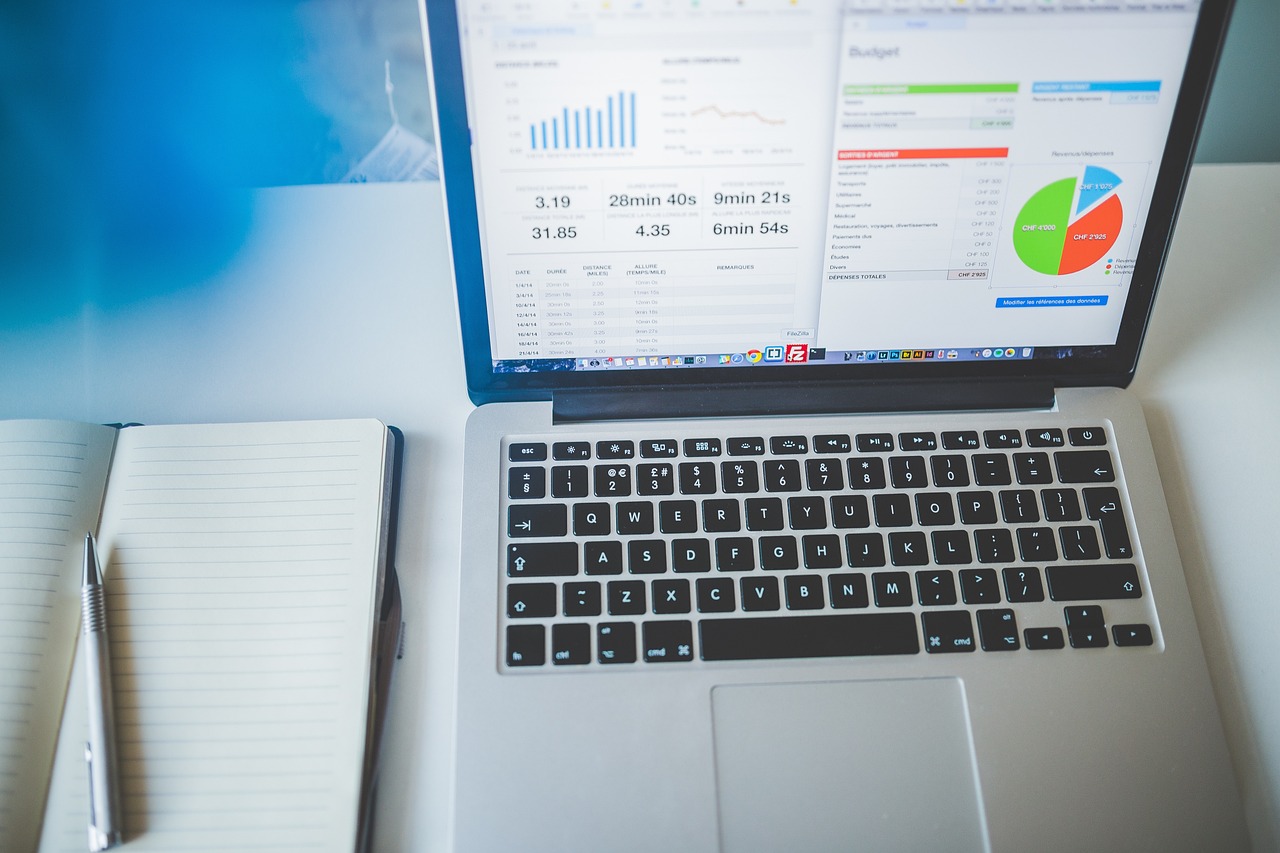 Laptop, notebook, business — Managing Costs and Fees in High-Risk Payment Processing