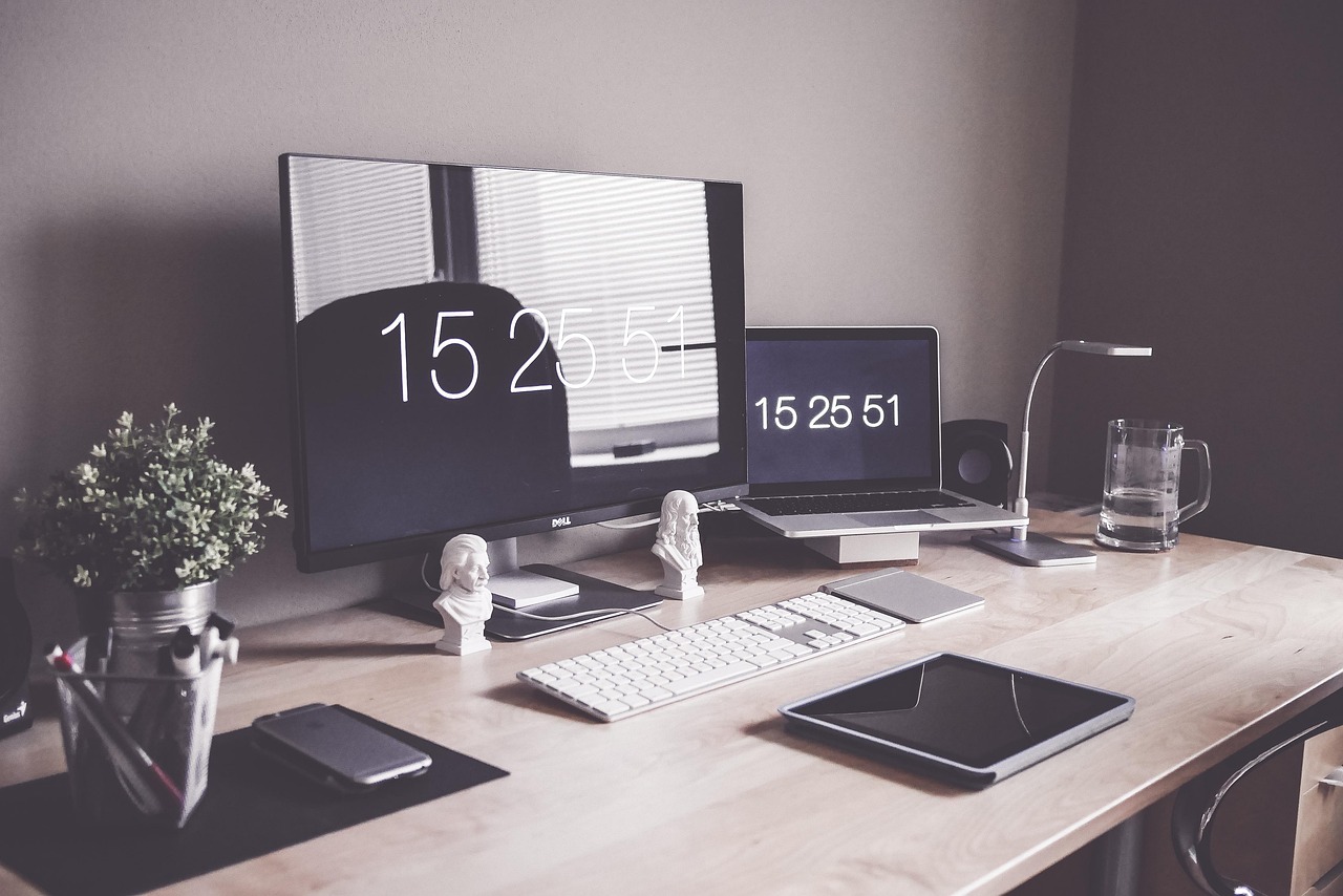 Home office, computer, desk — Replacing Hand Wrapping with Machine Shrink Wrapping